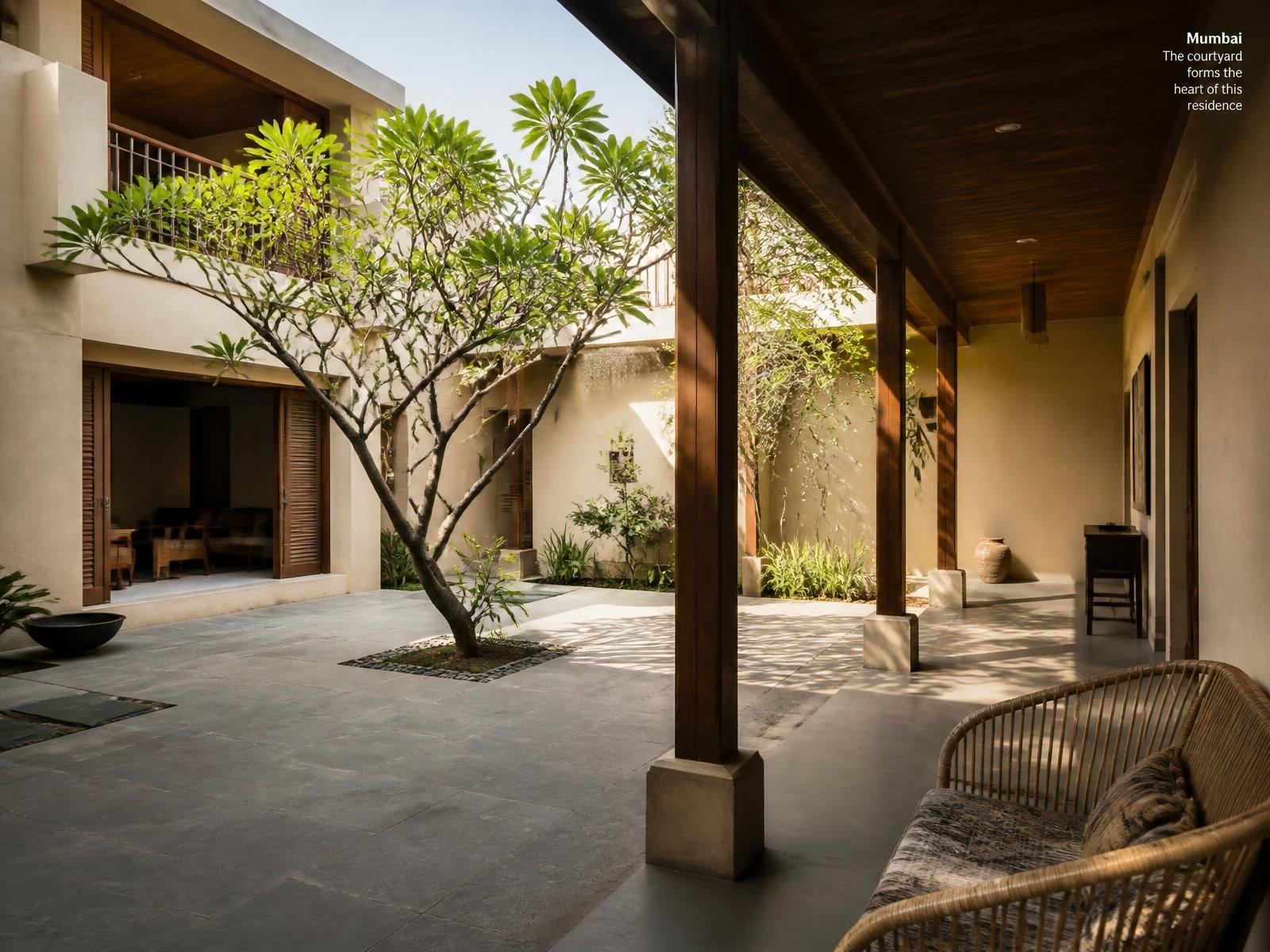 A four-bedroom home in Bandra reorganised around an open courtyard, trading corridors for shade, cross-breeze and a tree.